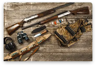 hunting-equipment-old-wooden-background-including-rifle-knife-binoculars-cartridges